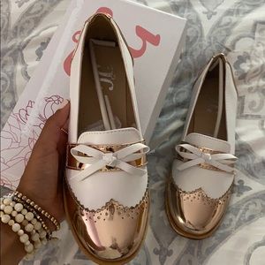 white and rose gold loafers